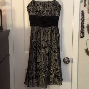 Black and Gold strapless cocktail dress BCBG